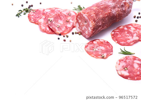 Sliced Smoked dry Salami sausage isolated on white background Sliced Smoked dry Salami sausage isolated on white background 96517572
