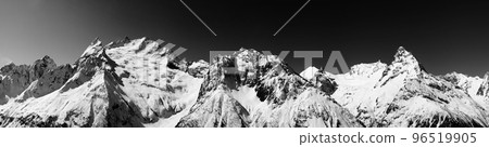 Black and white panorama of snowy covered mountain peak Black and white panorama of snowy covered mountain peak 96519905