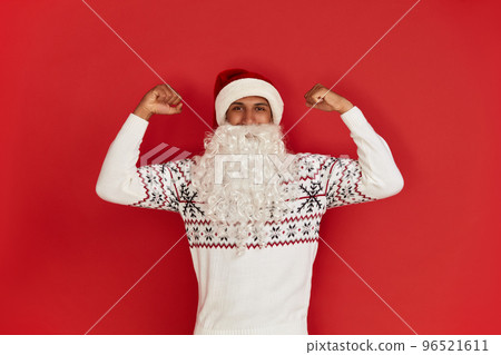 Santa Claus Showing Biceps. Portrait of Confident Proud Man Showing Biceps 96521611