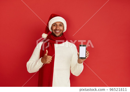 Happy Man Thumbs Up. Pleased Multiracial Man Smiling Showing Smartphone Happy Man Thumbs Up. Pleased Multiracial Man Smiling Showing Smartphone 96521811