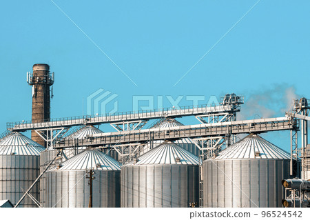 Towers of snowy silos in winter Towers of snowy silos in winter 96524542