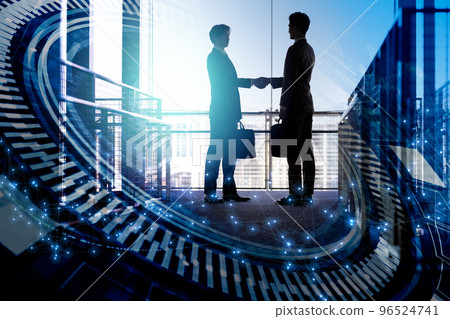 Two businessmen shaking hands Two businessmen shaking hands 96524741