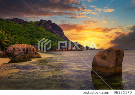 Colorful sunset over Anse Source D'argent beach at La Digue Island, Seychelles Colorful sunset over Anse Source D'argent beach at La Digue Island, Seychelles 96525170