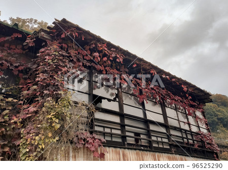 Abandoned house with broken window glass Abandoned house with broken window glass 96525290
