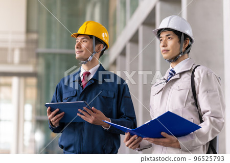 A man in his thirties wearing work clothes A man in his thirties wearing work clothes 96525793