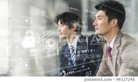 Cool businessman in his 30s-40s wearing a suit Cool businessman in his 30s-40s wearing a suit 96527248