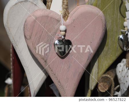 wooden shape heart detail close up wooden shape heart detail close up 96527822