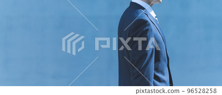 Cool businessman in his 30s-40s wearing a suit Cool businessman in his 30s-40s wearing a suit 96528258