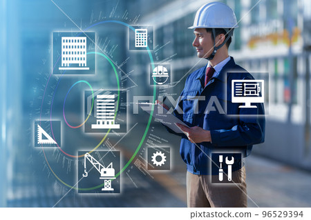 A man in his thirties wearing work clothes 96529394