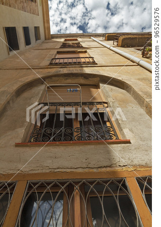 View of brown catalan Spanish house with window in Tarragona, Spain 96529576