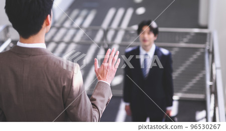 Cool businessman in his 30s-40s wearing a suit Cool businessman in his 30s-40s wearing a suit 96530267