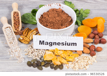 Inscription magnesium, healthy food and various ingredients as source natural magnesium Inscription magnesium, healthy food and various ingredients as source natural magnesium 96530526