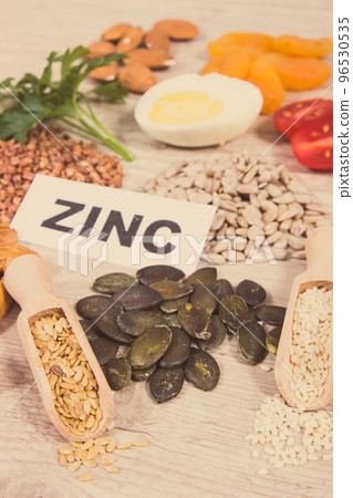 Healthy food and various ingredients as source natural zinc and other vitamins and minerals Healthy food and various ingredients as source natural zinc and other vitamins and minerals 96530535