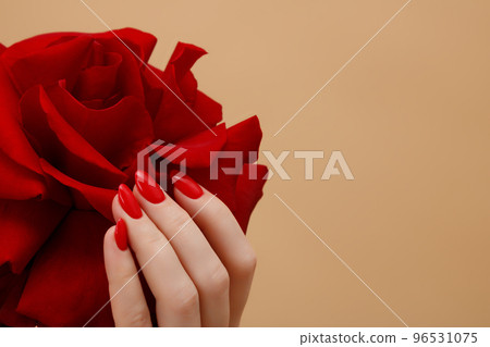 Beautiful female finger nails with red nail Beautiful female finger nails with red nail 96531075