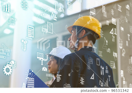 A man in his thirties wearing work clothes 96531342