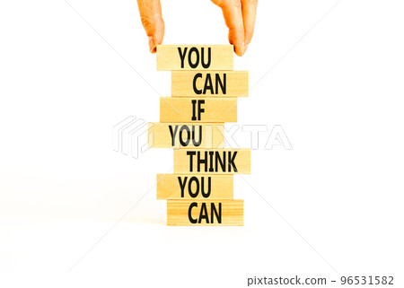 You can symbol. Concept words You can if you think you can on wooden blocks on a beautiful white table white background. Businessman hand. Business motivational and you can concept. 96531582