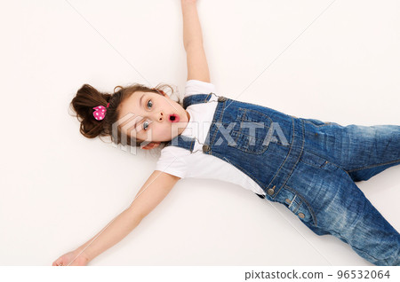 Little Girl Wearing Jeans Overalls Stock Image - Image of blond