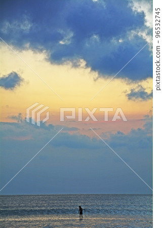 Surfing in the sunset, Kuta Beach, Bali 96532745