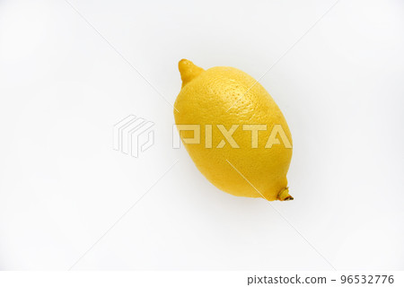 Yellow ripe lemon on a white background. Juicy lemons close-up. Isolate of the fruit of a yellow lemon. 96532776