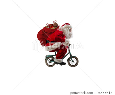 Santaclaus rides bike to deliver fast christmas gifts 96533612