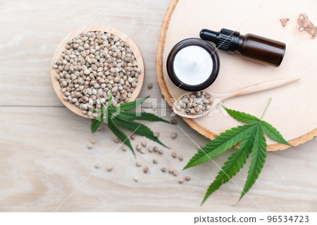 Legalized cannabis for skincare product features with set of CBD oil bottles. 96534723