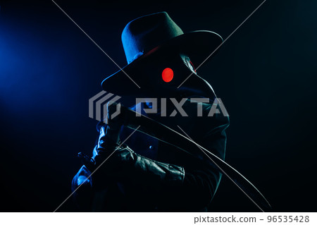 Plague doctor with sharp scythe on black smoke background. Creepy raven mask, halloween, historical Plague doctor with sharp scythe on black smoke background. Creepy raven mask, halloween, historical 96535428