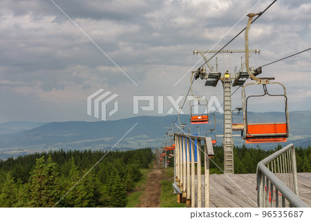 Empty chairlift in Jesenik mountains, upper station of chairlift 96535687