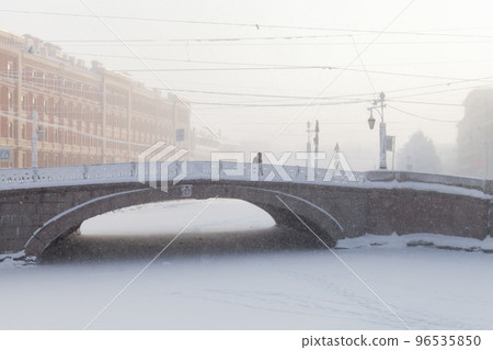 St-Petersburg on a winter day, street view with the Mogilev bridge 96535850