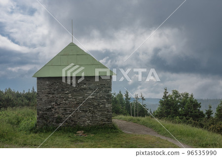Stone shed , refuge for tourists in case of bad weather, on a summer foggy day, Jesenik mountains Stone shed , refuge for tourists in case of bad weather, on a summer foggy day, Jesenik mountains 96535990