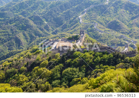 the protective wall goes like a snake over the hills. beautiful view of the mountains and the wall. the protective wall goes like a snake over the hills. beautiful view of the mountains and the wall. 96536313
