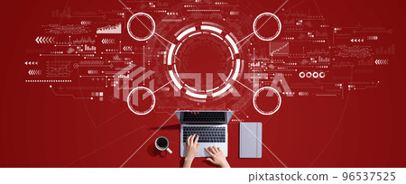 Tech circle with person working with laptop 96537525