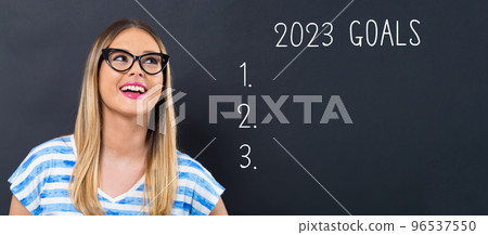 2023 goals with happy young woman 96537550
