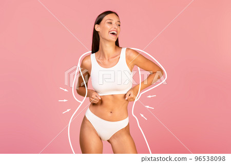 Body Care Concept. Happy Young Woman With Slim Body Posing In Underwear Body Care Concept. Happy Young Woman With Slim Body Posing In Underwear 96538098
