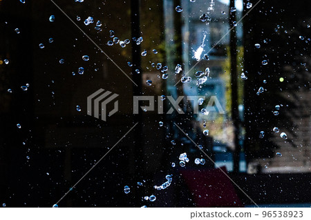 Slow motion image of the moment when the spray floats in the air 96538923
