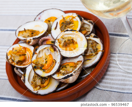 Dog cockles served in bowl 96539467