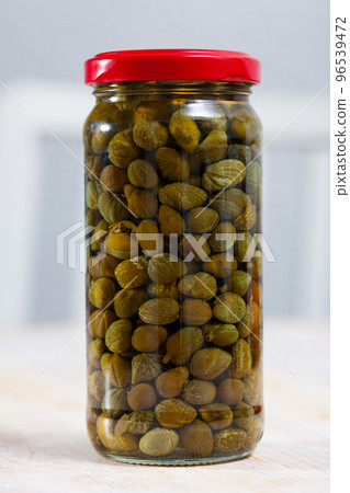 Canned capers in glass jar 96539472