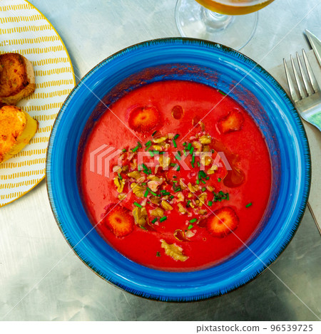 Beetroot salmorejo with nut and strawberry 96539725