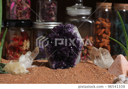 Amethyst Stone and Quartz Crystals on Australian Red Sand 96541339