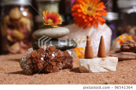 Aragonite Crystal With Incense Cones on Australian Red Sand Aragonite Crystal With Incense Cones on Australian Red Sand 96541364