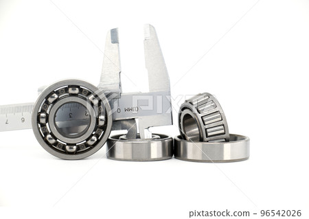 Group of roller bearings and caliper over white Group of roller bearings and caliper over white 96542026
