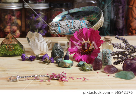 Dried Flowers and Crystal Stones on Meditation Altar Shallow DOF 96542176