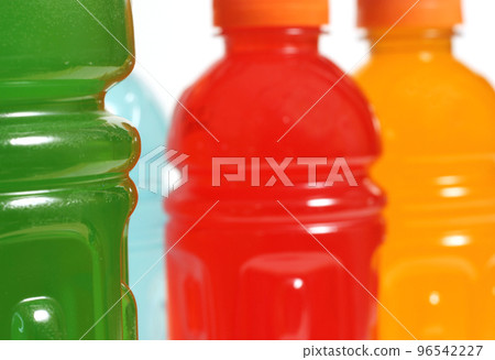 Bottles of Colorful Sports Drinks on White Background 96542227