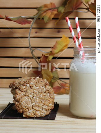 Oatmeal Peanut Butter Cookies With Almond Milk in Rustic Kitchen 96542232