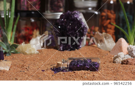 Amethyst Crystals and Chakra Stones on Australian Red Sand. Meditation Table Amethyst Crystals and Chakra Stones on Australian Red Sand. Meditation Table 96542256