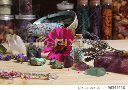 Dried Flowers and Crystal Stones on Meditation Altar Shallow DOF 96542338