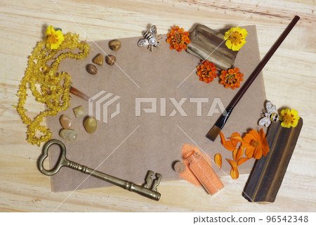 Yellow and Gold Flowers With Golden Stones and Brass Key on old Paper Yellow and Gold Flowers With Golden Stones and Brass Key on old Paper 96542348