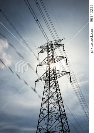 Silhouette of high voltage tower and electric line with the sky background. 96543232