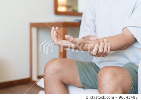 man having wrist pain because using smartphone or computer long time. De Quervain s tenosynovitis, rheumatism, arthritis, osteoarthritis, ergonomic, Carpal Tunnel Syndrome or Office syndrome man having wrist pain because using smartphone or computer long time. De Quervain s tenosynovitis, rheumatism, arthritis, osteoarthritis, ergonomic, Carpal Tunnel Syndrome or Office syndrome 96543488