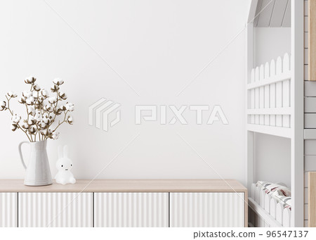Empty white wall in modern child room. Mock up interior in scandinavian style. Copy space for your picture or poster. Bed, sideboard, cotton plant in vase. Cozy room for kids. 3D rendering. 96547137