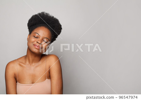 Attractive young woman enjoying. Beauty, facial treatment, skin care and cosmetology concept 96547974